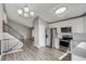 Updated kitchen with stainless steel appliances, gray countertops, and white cabinets at 3969 S Fundy Cir, Aurora, CO 80013