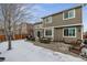 Large backyard with patio furniture and a partially visible shed at 2400 S Halifax Way, Aurora, CO 80013