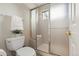 This bathroom is equipped with an easy-access shower and a comforting corner seat at 6664 S Webster St, Littleton, CO 80123