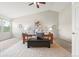 Spacious main bedroom featuring vaulted ceiling and a ceiling fan at 6664 S Webster St, Littleton, CO 80123