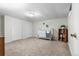 Inviting bedroom with neutral walls, carpet, and plenty of closet space at 6664 S Webster St, Littleton, CO 80123