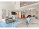Open floorplan featuring the living room and dinette area, and the second story loft at 6664 S Webster St, Littleton, CO 80123