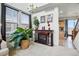 Stylish living area with fireplace and a view into the kitchen at 5556 Lewiston Ct, Denver, CO 80239