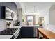 Modern kitchen with stainless steel appliances and an island at 4925 W 10Th Ave # 111, Denver, CO 80204