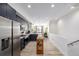 Modern kitchen with stainless steel appliances, island and stylish cabinetry at 4925 W 10Th Ave # 111, Denver, CO 80204