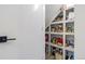 Pantry featuring open shelving and a variety of food items at 4925 W 10Th Ave # 111, Denver, CO 80204