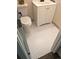 Bathroom with white hexagon tile flooring at 3225 S Garrison St # 19, Lakewood, CO 80227