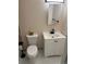 Updated bathroom boasts a modern sink and vanity area with ample storage at 3225 S Garrison St # 19, Lakewood, CO 80227