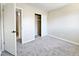 View of bedroom showcasing new carpet, closet and fresh paint at 3225 S Garrison St # 19, Lakewood, CO 80227