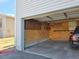 Attached garage providing secure parking and added storage solutions at 3225 S Garrison St # 19, Lakewood, CO 80227