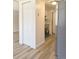 Bright kitchen features new stainless steel appliances and white cabinetry at 3225 S Garrison St # 19, Lakewood, CO 80227