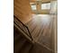 A living room featuring light wood-look floors and natural light at 3225 S Garrison St # 19, Lakewood, CO 80227