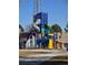 Colorful community playground with slides and climbing area, ideal for children and outdoor fun at 3225 S Garrison St # 19, Lakewood, CO 80227