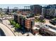 Stunning aerial view of a modern building complex, near a stadium, showcasing its urban location and architectural design at 1735 19Th St # 6D, Denver, CO 80202