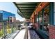 Relaxing balcony space with comfortable seating, city views, and stylish decor, ideal for enjoying urban living at 1735 19Th St # 6D, Denver, CO 80202