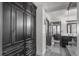 Spacious Primary bathroom with custom dark cabinetry and access to the Primary bedroom at 1735 19Th St # 6D, Denver, CO 80202