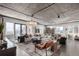 Spacious living room boasts an open layout, modern lighting, and floor to ceiling windows at 1735 19Th St # 6D, Denver, CO 80202