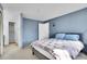 Bright bedroom with a large window and ample closet space, offering a serene and inviting atmosphere at 7891 Allison Way # 201, Arvada, CO 80005