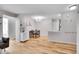 Open dining area featuring hardwood floors and ample space for entertaining at 7891 Allison Way # 201, Arvada, CO 80005