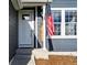 Inviting front entrance showcasing a white front door and a welcoming welcome sign at 317 Bonanza Dr, Erie, CO 80516