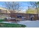 This patio boasts outdoor seating and a grill, offering a stylish and functional space for enjoying the outdoors at 317 Bonanza Dr, Erie, CO 80516