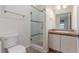 Bathroom with mosaic tile shower and granite vanity countertop at 1030 Jersey St # 1, Denver, CO 80220