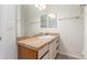 Bathroom featuring a vanity with granite countertop and ample lighting at 1030 Jersey St # 1, Denver, CO 80220