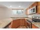 Charming kitchen featuring granite countertops and stainless steel appliances at 1030 Jersey St # 1, Denver, CO 80220