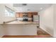Cozy kitchen featuring stainless steel appliances and granite countertops at 1030 Jersey St # 1, Denver, CO 80220