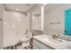 Bathroom with granite countertop, a tub, and a shower at 77 N Jackson Gap Way, Aurora, CO 80018