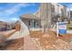 Beautiful exterior view of a home for sale, featuring a manicured front yard and a 'For Sale' sign at 1267 Quitman St, Denver, CO 80204