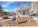 Home exterior with a 'For Sale' sign, showcasing a well-maintained front yard at 1267 Quitman St, Denver, CO 80204