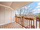 View of the balcony showcasing storage space, decorative planters, and neighborhood views at 9677 W Chatfield Ave # E, Littleton, CO 80128