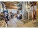 Unfinished basement area with exposed ceiling, mechanicals, and ample storage space, providing a blank canvas for customization at 19105 Eagle Ridge Dr, Golden, CO 80401