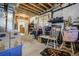 Unfinished basement area with exposed beams, painted walls, door frame and offering potential for future customization at 19105 Eagle Ridge Dr, Golden, CO 80401