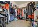 Walk-in closet featuring metal racks with ample hanging space and shelving for organizing clothes and personal items at 19105 Eagle Ridge Dr, Golden, CO 80401