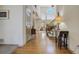 Spacious home foyer with hardwood floors, a high ceiling, and an elegant staircase at 19105 Eagle Ridge Dr, Golden, CO 80401