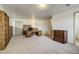 Large office space featuring built-in bookshelves, desk, and wooden dresser at 19105 Eagle Ridge Dr, Golden, CO 80401