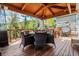 Relaxing outdoor patio with beautiful views, a pergola, and outdoor dining set at 19105 Eagle Ridge Dr, Golden, CO 80401