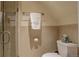 Compact bathroom featuring a shower with glass door and neutral tones for a serene space at 345 S Ogden St, Denver, CO 80209