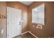 Mud room featuring washer/dryer hookups and tile flooring at 1386 Avgare Way, Erie, CO 80516