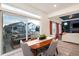 Bright dining area with patio access and views of the backyard and neighborhood at 56 Magnolia Ct, Erie, CO 80516