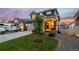 Beautiful two-story home with manicured lawn and a gravel driveway, plus space for RV parking at 56 Magnolia Ct, Erie, CO 80516