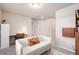 Inviting room with comfortable seating, neutral tones, and ample natural light at 56 Magnolia Ct, Erie, CO 80516