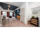 Stylish living room featuring hardwood floors, a modern fireplace, and bright, open layout at 56 Magnolia Ct, Erie, CO 80516