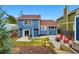 Relax in the backyard with deck, patio, and lawn, great for entertaining with string lights and a fire pit at 3593 S Gibralter Cir, Aurora, CO 80013