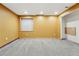 Expansive basement has neutral carpet, recessed lights, and an open closet area at 3593 S Gibralter Cir, Aurora, CO 80013