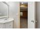 Bathroom transitions to the basement, offering convenience and functionality with a clean aesthetic at 3593 S Gibralter Cir, Aurora, CO 80013