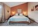 Bright bedroom with large windows, soft carpet, earth-tone walls, and modern decorative touches at 3593 S Gibralter Cir, Aurora, CO 80013