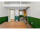 Office space features an exposed ladder to a loft, and a mirror closet to optimize your work space at 3593 S Gibralter Cir, Aurora, CO 80013